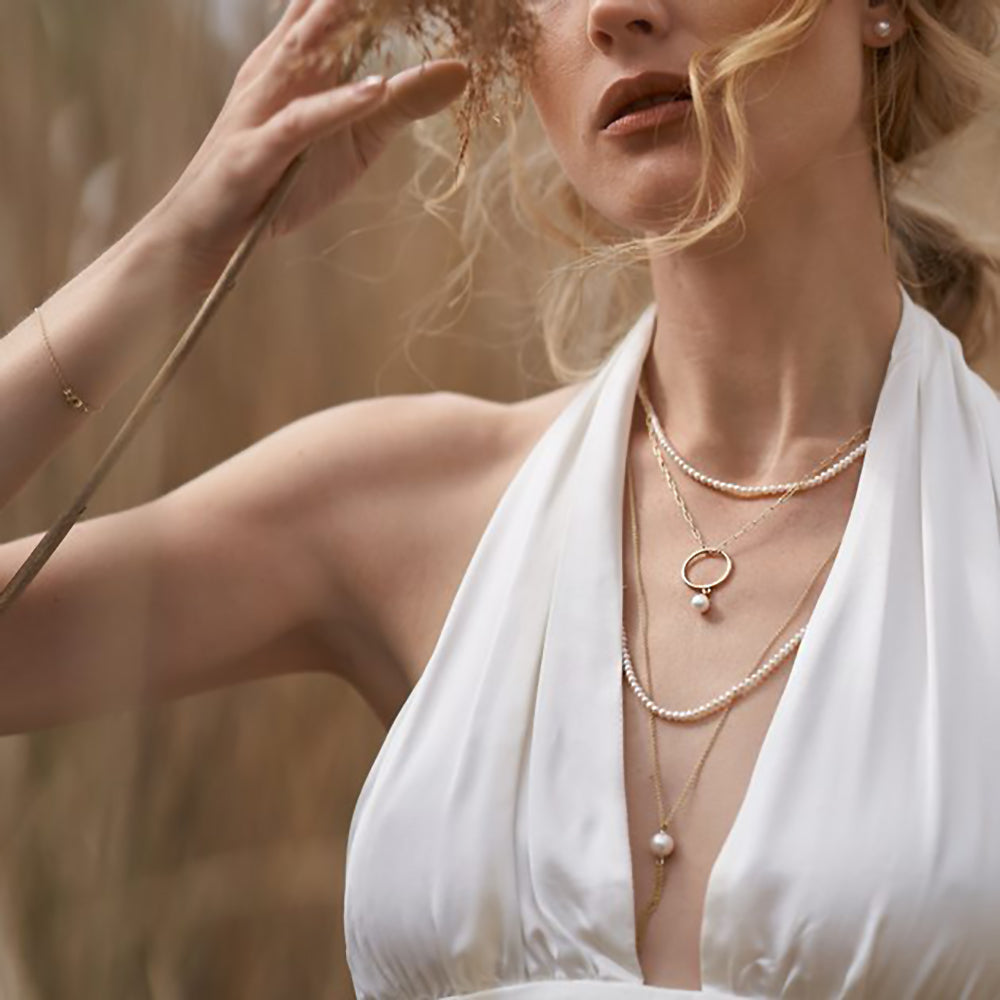 How to Wear a Pearl Rope: Layered with Chains and Pendants