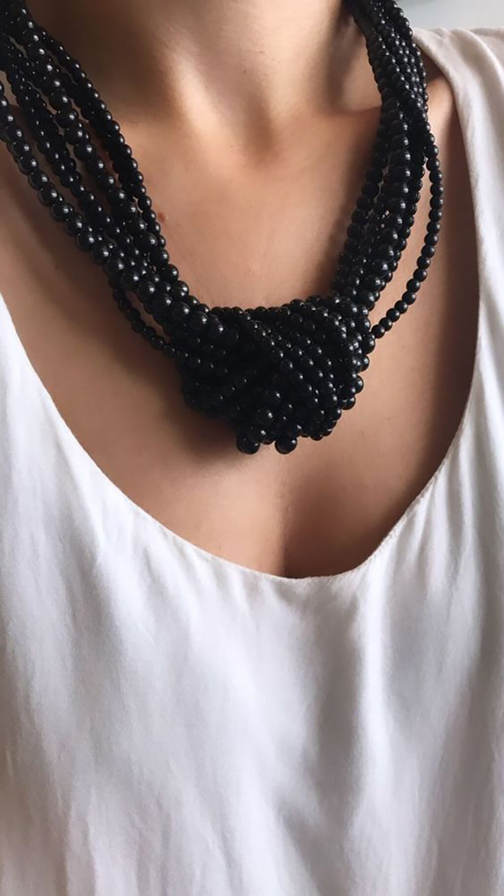 Black Akoya Pearl Necklaces Knotted Together