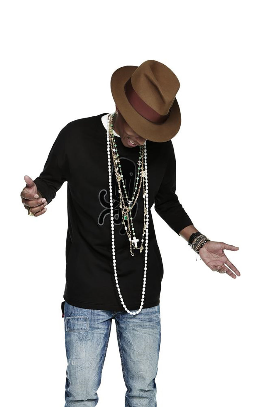 Men Wearing Pearls Trend 2023: Pharrell Williams Layered Pearl Ropes