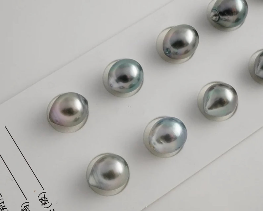 Black Tahitian Pearls Showing Silver Overtones