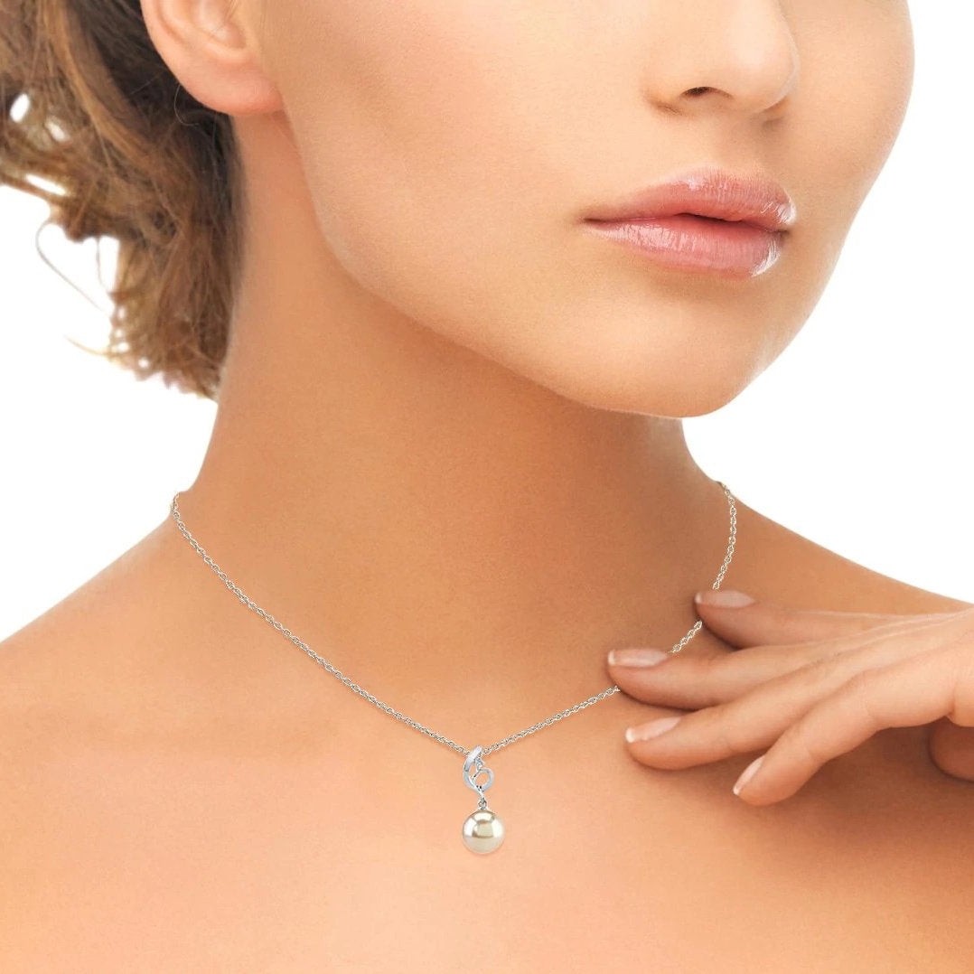 Styled shot of model wearing 8.0-8.5mm Akoya Pearl & Diamond Symphony Pendant