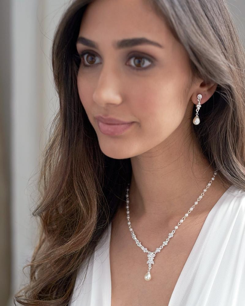 Styled model wearing Dareth Colburn's elegant Primrose Jewelry Set