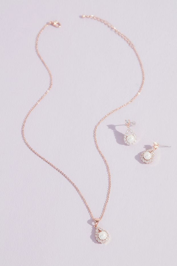 Flay lay shot of David's Bridal Haloed Faux Pearl Necklace and Earring Set