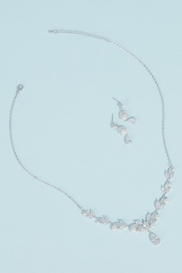 Flat lay shot showing details of David’s Bridal Pearl Cubic Zirconia Leaf Necklace and Earring Set