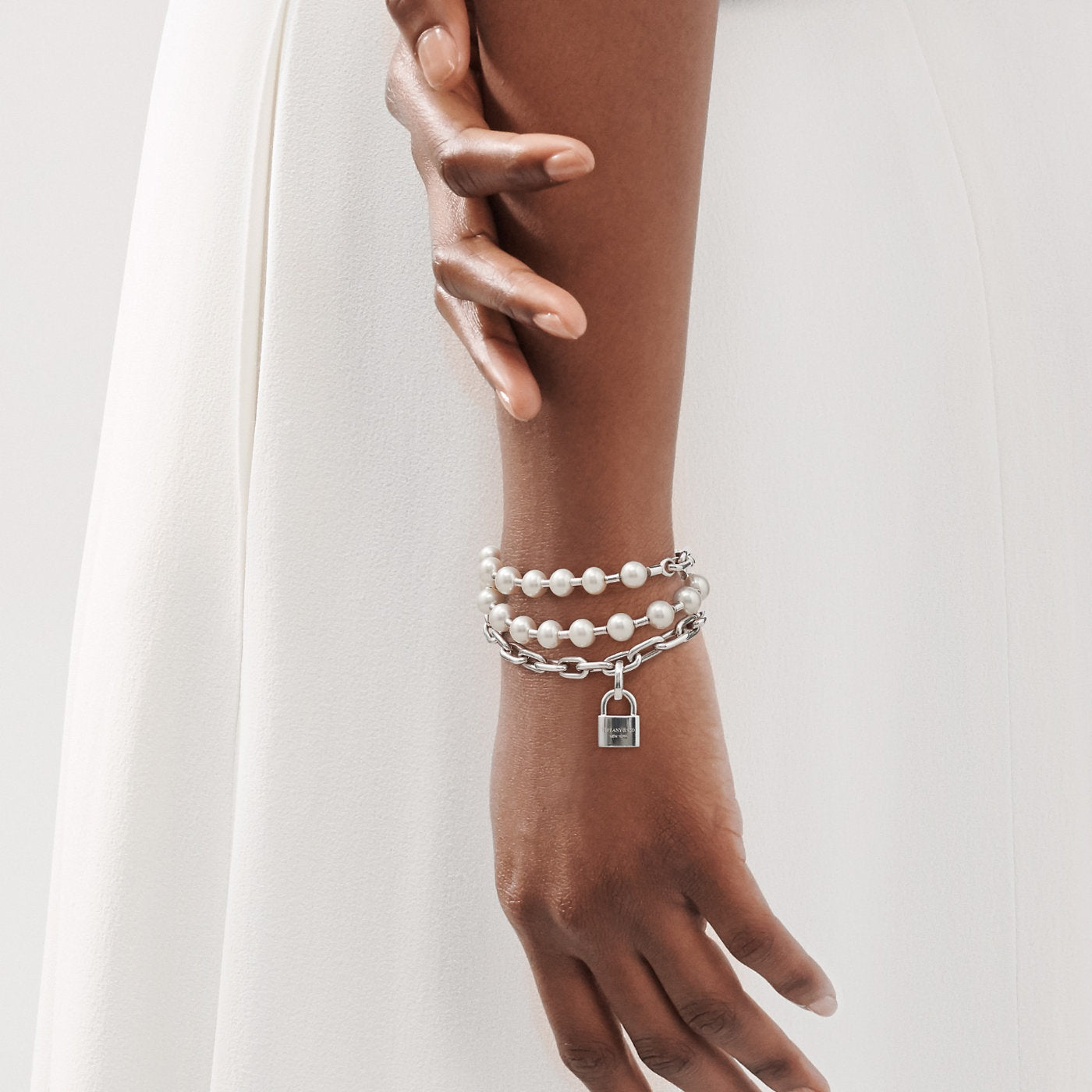 Model wearing Pearl Lock Bracelet in Silver from Tiffany