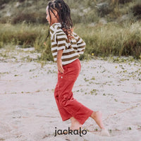 girl running with red pants