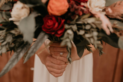 boho bridal feature engagement ring wood flowers