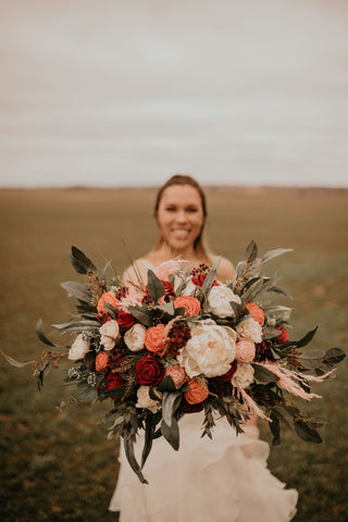 North Wood Blooms LLC of Antigo WI creates handmade wood flower bouquets and arrangements with sola wood flowers