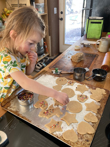 three year old making cookies