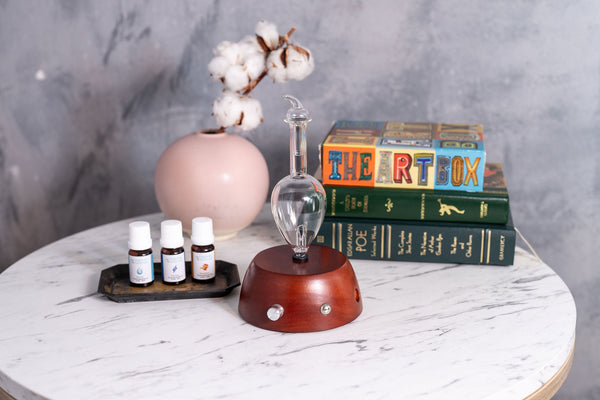 Nebulizer with some essential oils on a table