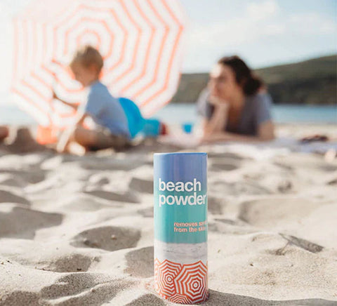 Beach Powder removes sand from skin