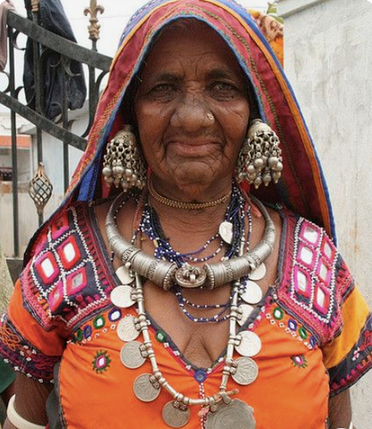 Lambani Tribal Woman wearing the Jhumki form as hair ornaments 