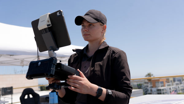 Lucie Hronek, a Remote Pilot from Flying Lion acting as the RPIC at SkyOne, SMPD's rooftop. 