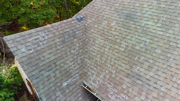 Why Conduct Roof Inspections? Inspection markings on a roof after an inspection of a home