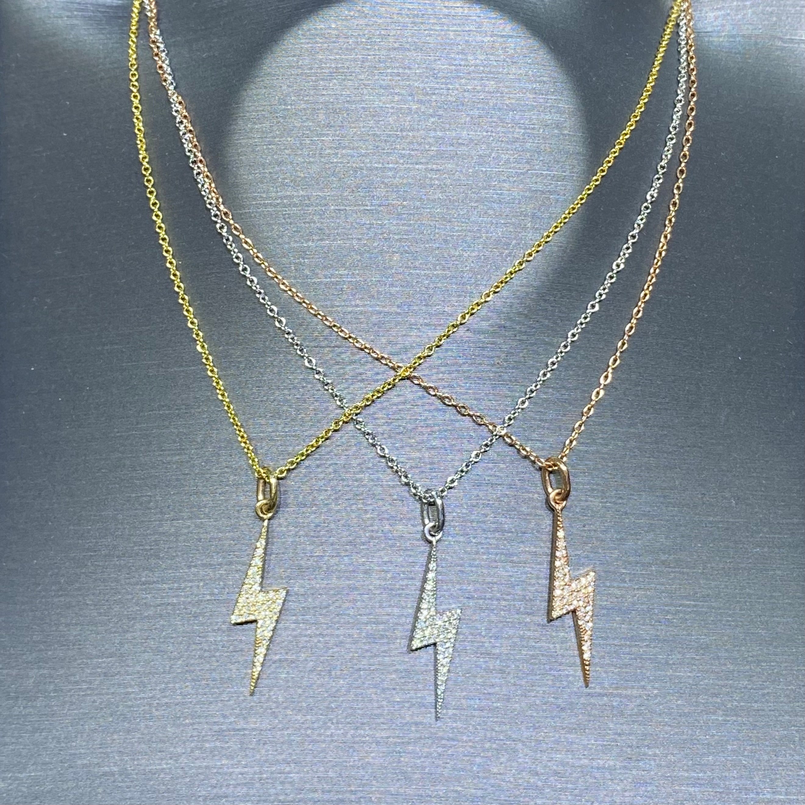 Our beautiful diamond lightening bolt pendant on an adjustable 14k 14-16  chain will be your best gift of the season!