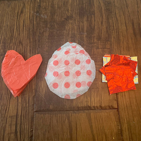 Step 1: Cut tissue paper into identifiable shapes - triangle, circle, square, and heart.