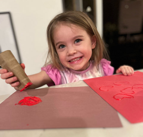 Break out the paper, some red paint, and an art smock, and start making Valentines!