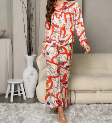 MODEL IN MULTI PRINT BELL PANT SET