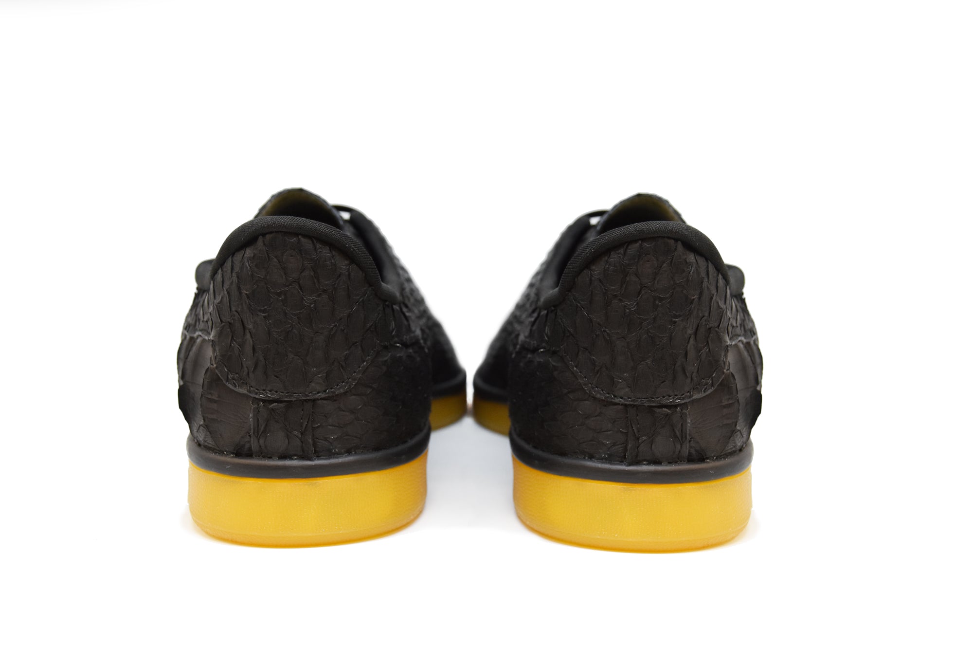 stan smith black python