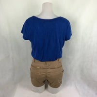 brown shorts blue shirt