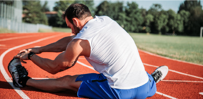 Man stretching before run