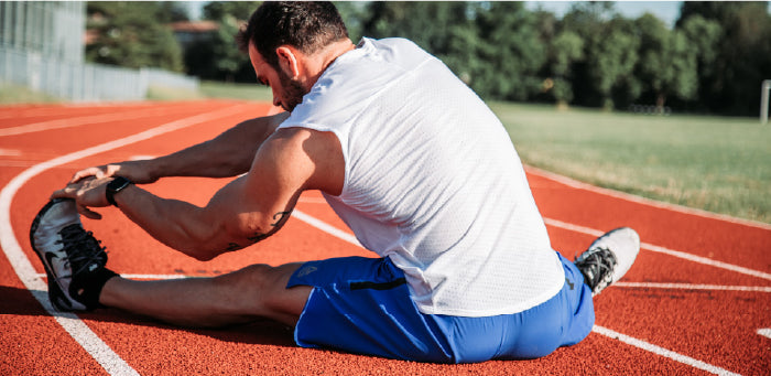 Man stretching after workout