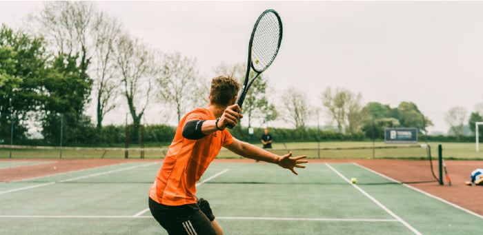 Man Playing Tennis