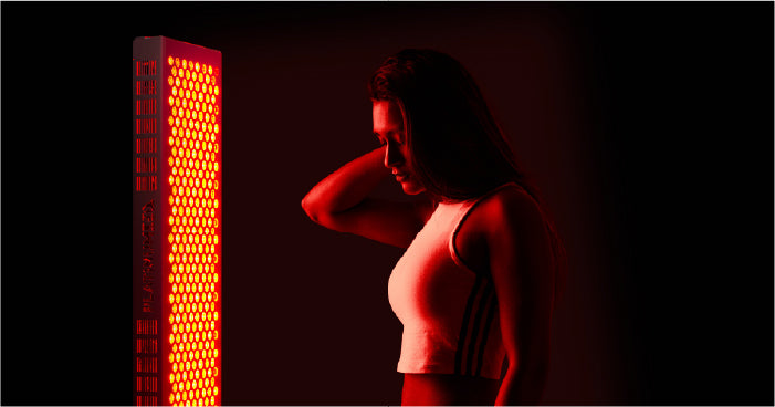 woman getting red light therapy on her face