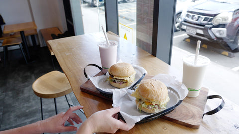 Serving burgers at Jax Burger Shack