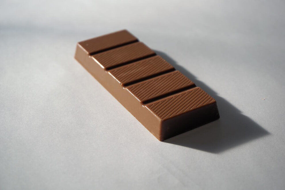 a plain bar of chocolate on a white background