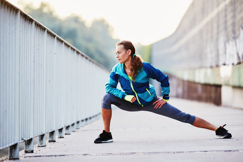 Woman stretching before a run