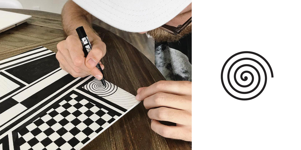 Left Image: Artist leaning over a skateboard, his face close to the deck as he slowly draws a spiral in black using a paint marker, the rest of the board is covered with geometric patterns. Right Image: A black spiral to show the artist's Archimedean spiral