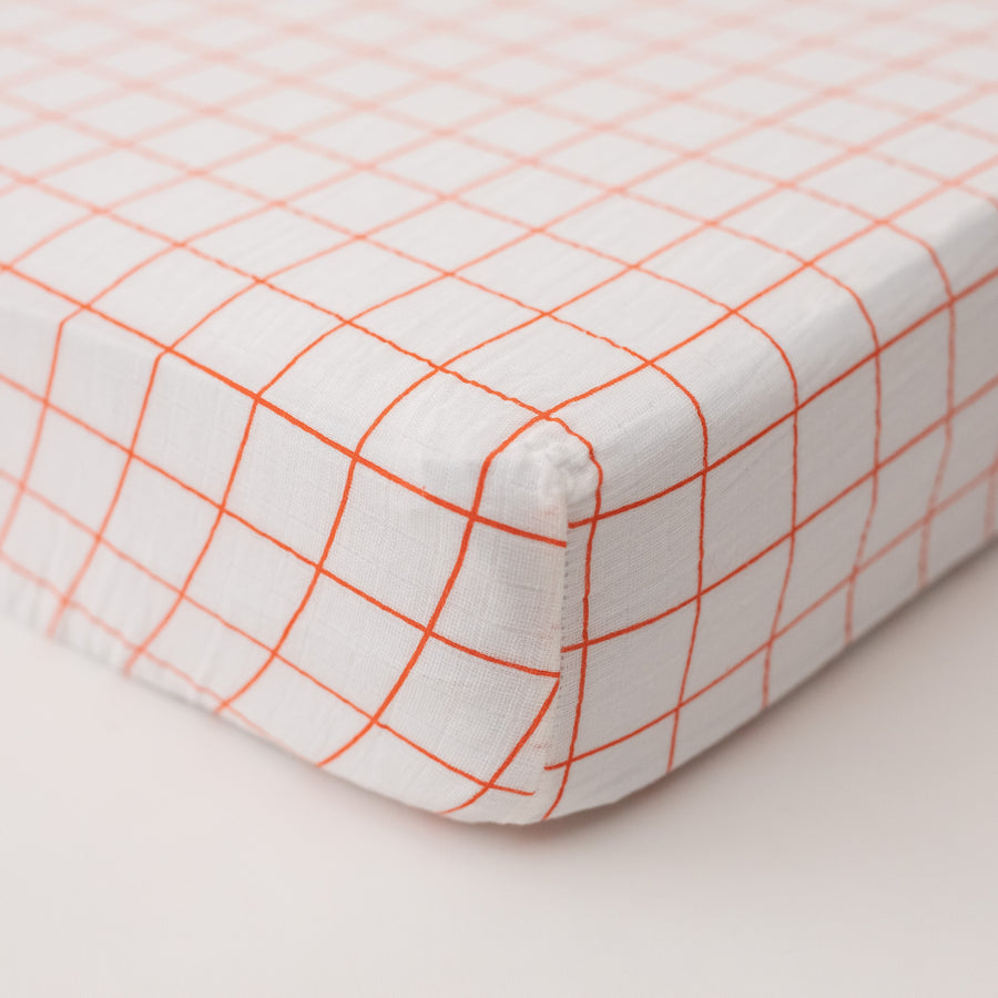 orange crib sheet