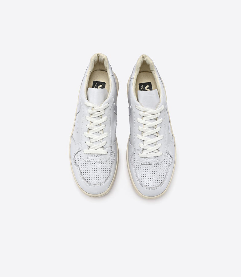 white uptown sneakers