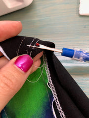 ripping coverstitch stitches