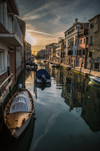 Sunset reflected on the Rio de la Sensa in Venice Italy