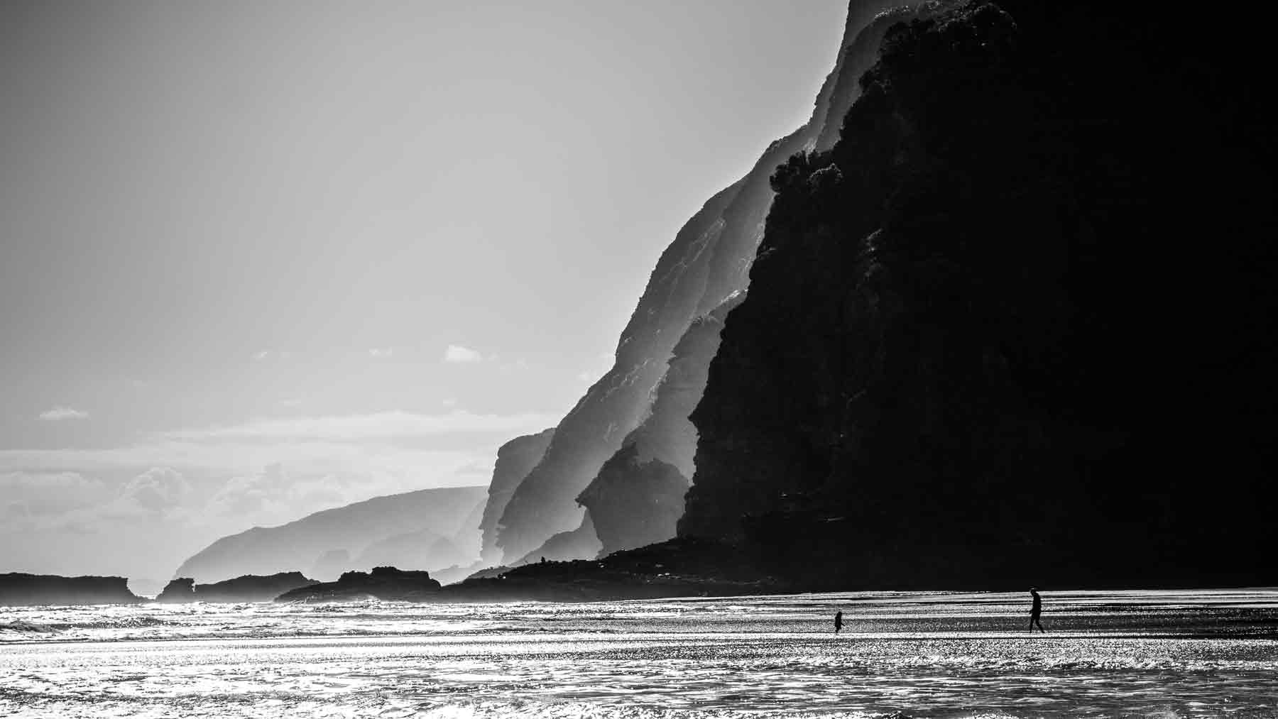 Clothing Care try not to over wash your clothes. Black and white Karekare beach New Zealand