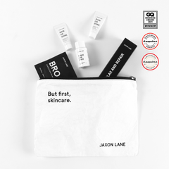 "But first, skincare" travel pouch containing Jaxon Lane travel set products.