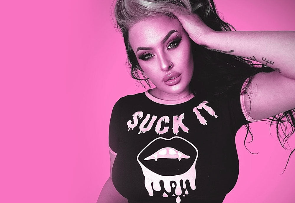 Crowd-pleasing pink clothing item #6 : Vamp Lips 'Suck It' Ringer Baby Tee