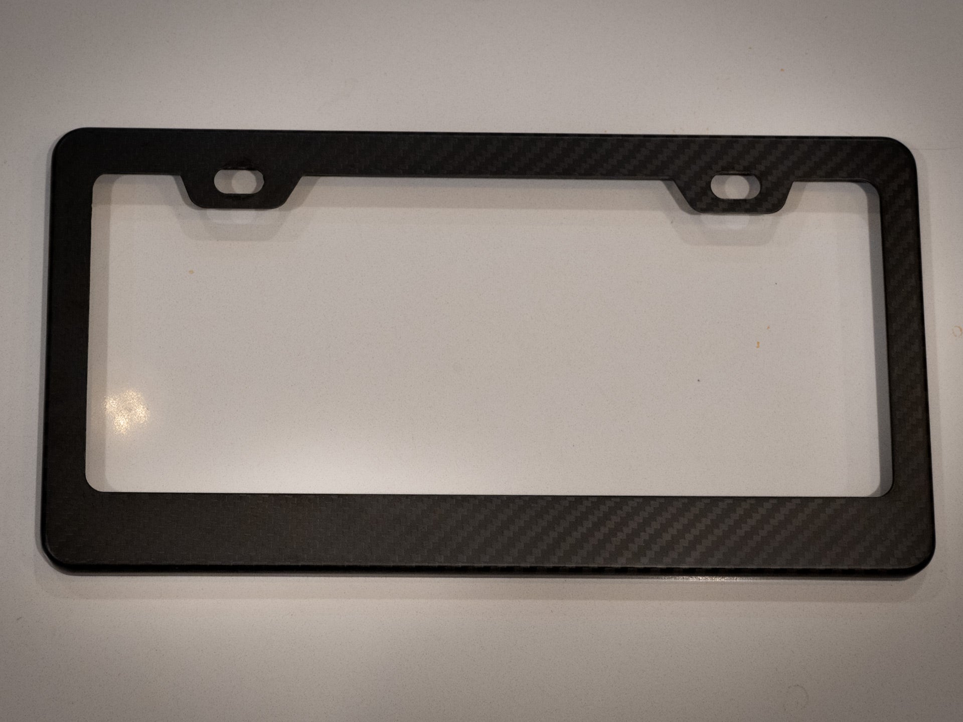 forged carbon fiber license plate frame