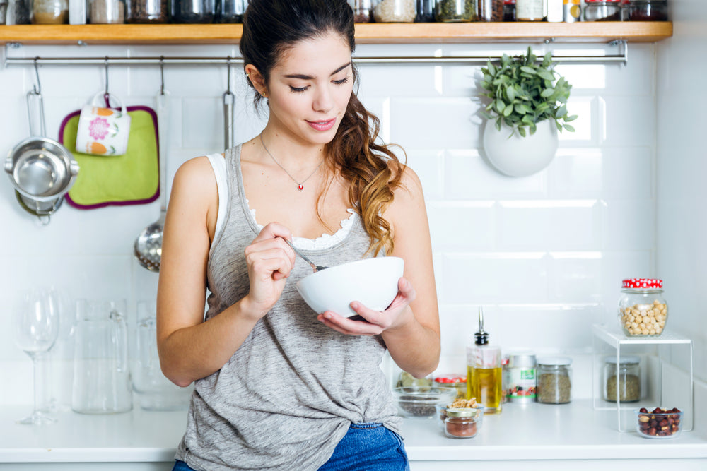 Woman eating healthy fats