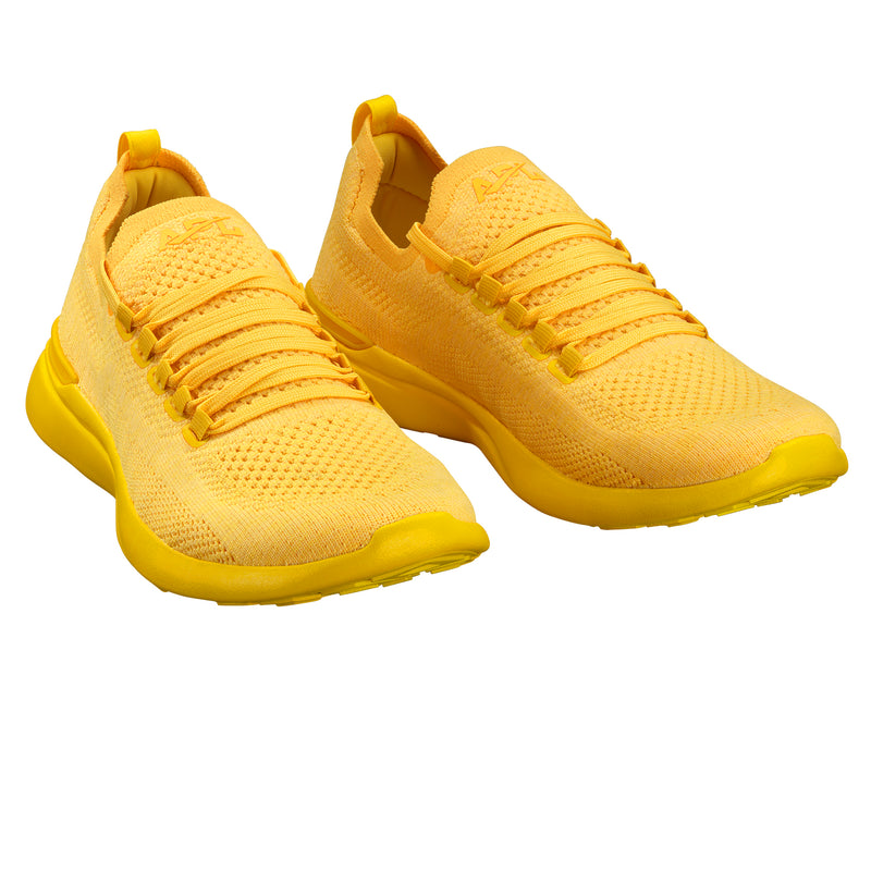 yellow apl sneakers