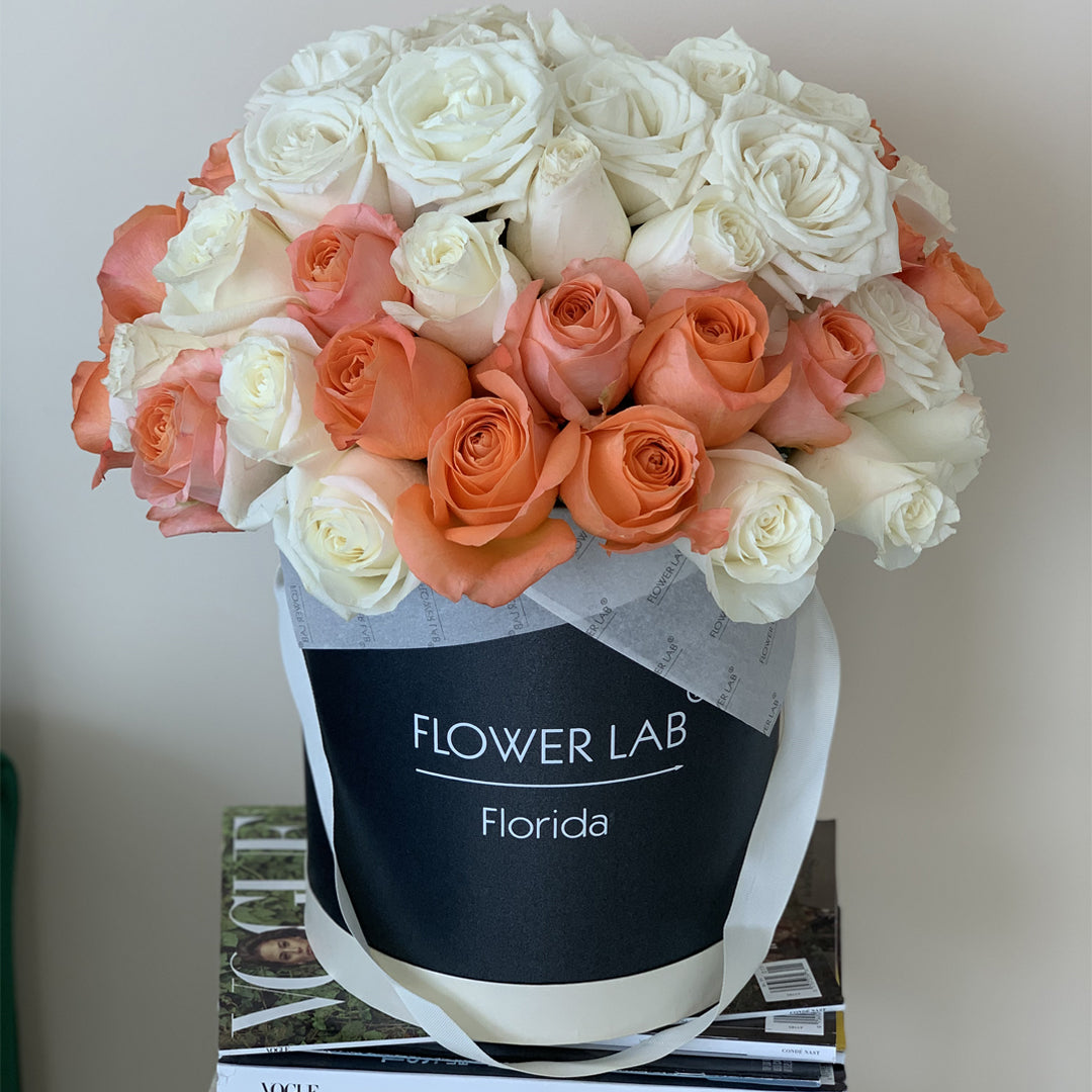 Eliza with white and orange roses