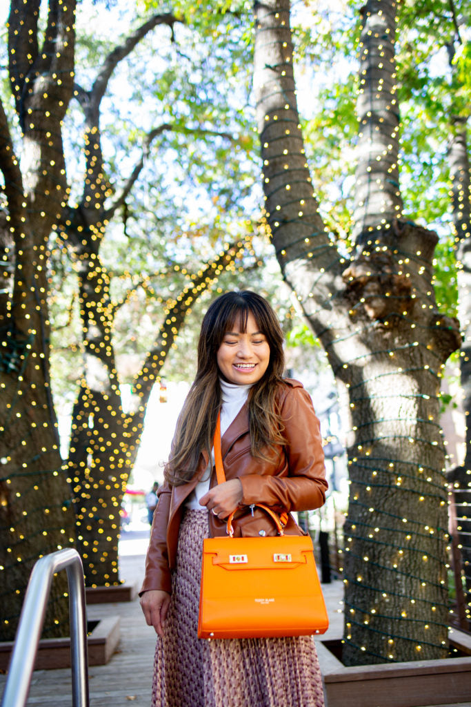 KIM ORANGE RADIATES WARMTH AND HAPPINESS by mypetitetheory.com – Teddy Blake