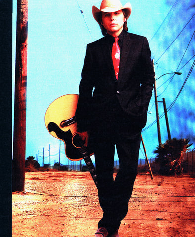 Dwight Yoakam in Christian Dior suit, Tom Ford for YSL Rive Gauche shirt and Mimi Fong tie.