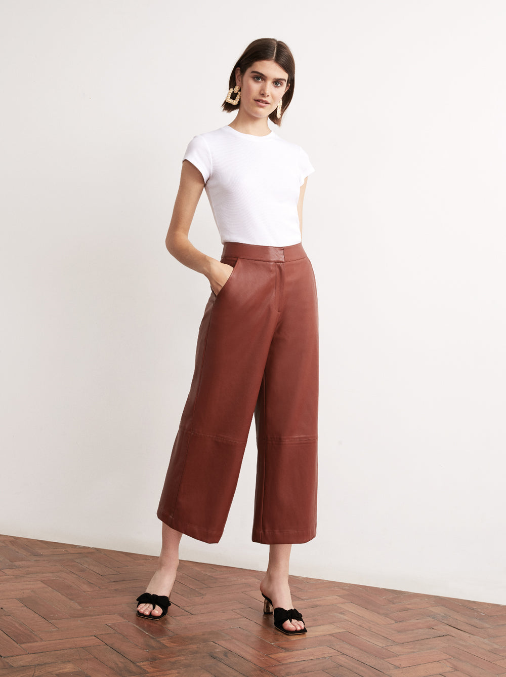 berry faux leather trousers