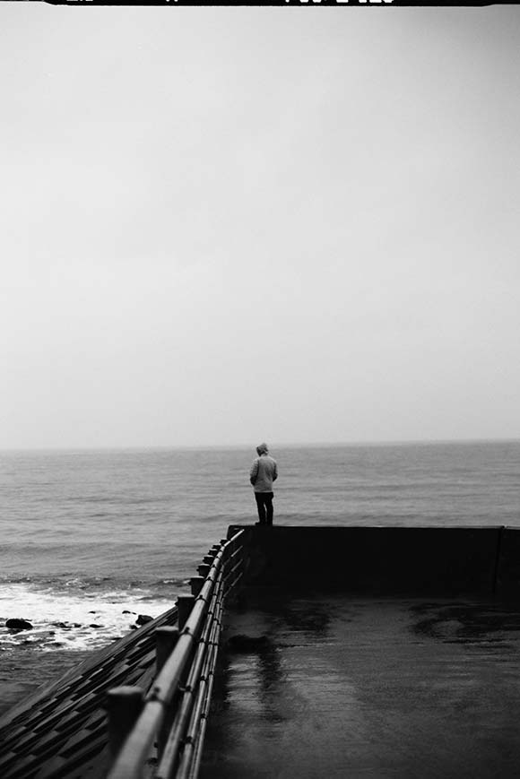 Man looking out to sea