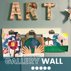 Wall with the word, "Art" and below it are 3 hung pieces of children's art.