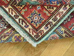 Folded edge of an oriental rug