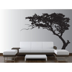 Black and white design living room with a black tree decal on the back wall.